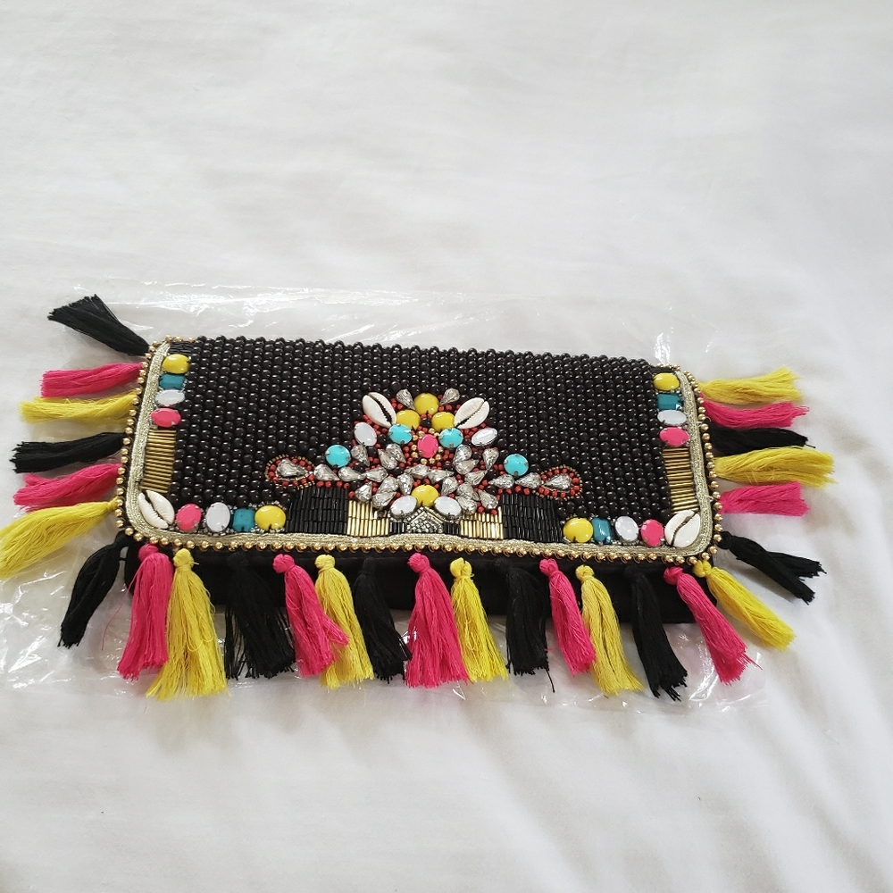 American & beyond tassel clutch